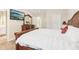 Bedroom featuring a wooden bed and dresser, as well as an ensuite bathroom at 3709 Mcguire Nw St, Kennesaw, GA 30144