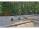 Community playground area features colorful play structures, a bench, and soft ground covering for safety at 3709 Mcguire Nw St, Kennesaw, GA 30144