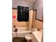 Cozy bathroom with a tub/shower combination and classic tile work at 4513 College St, Forest Park, GA 30297