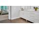 Modern bathroom features white cabinets and tile floors at 1473 Cardova Pointe, Dunwoody, GA 30338