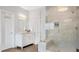Bright bathroom features double vanity, tile shower, and modern fixtures at 1473 Cardova Pointe, Dunwoody, GA 30338