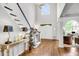 Elegant entryway with hardwood floors, staircase, and views of the office at 1473 Cardova Pointe, Dunwoody, GA 30338