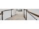 Close up of a hallway that features carpet, white walls, and a white railing at 1473 Cardova Pointe, Dunwoody, GA 30338