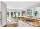 This open-concept kitchen showcases granite countertops, a gas cooktop, and backyard views at 1473 Cardova Pointe, Dunwoody, GA 30338