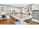 Spacious kitchen features granite counters, bar seating, and stainless appliances at 1473 Cardova Pointe, Dunwoody, GA 30338