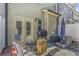 Cozy outdoor patio setup, with grill, seating, and privacy fence, ideal for entertaining and enjoying the backyard at 2772 Archway Ln, Brookhaven, GA 30341