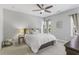 Cozy bedroom featuring soft natural light, neutral decor, and plush carpeting at 2772 Archway Ln, Brookhaven, GA 30341