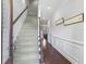 Inviting foyer with stairs and beautiful wainscoting adding elegance to the interior design at 2772 Archway Ln, Brookhaven, GA 30341