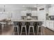 Modern kitchen featuring a spacious island with seating, sleek countertops, and ample cabinetry at 2772 Archway Ln, Brookhaven, GA 30341