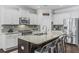 Modern kitchen with stainless steel appliances, granite countertops, and ample cabinet space at 2772 Archway Ln, Brookhaven, GA 30341