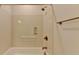 Modern bathroom shower stall with handheld shower and a convenient grab bar at 3411 Lindenridge Dr, Buford, GA 30519
