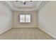 Bedroom features include neutral carpet, recessed lighting and a large window at 3411 Lindenridge Dr, Buford, GA 30519