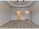 Large bedroom features include neutral carpet, recessed lighting, and multiple doorways at 3411 Lindenridge Dr, Buford, GA 30519