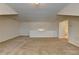 Expansive bonus room with neutral carpet and flexible space for various activities at 3411 Lindenridge Dr, Buford, GA 30519