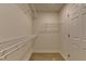 Spacious walk-in closet with carpet flooring and wire shelving at 3411 Lindenridge Dr, Buford, GA 30519