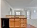 A bright kitchen offering a convenient view into the living space, enhancing the home's open concept layout at 3411 Lindenridge Dr, Buford, GA 30519