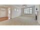 Inviting living room with large windows and fireplace at 3411 Lindenridge Dr, Buford, GA 30519
