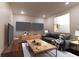 Cozy living room with a television, comfortable sofa, and modern décor at 607 Hickory Creek Ln, Woodstock, GA 30188