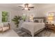 Serene main bedroom with neutral tones, plush carpet, and bright natural light at 607 Hickory Creek Ln, Woodstock, GA 30188