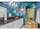 Modern bathroom features stone tile shower, stone vessel sink, and ample lighting at 881 Memorial Se Dr # 116, Atlanta, GA 30316