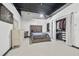 Bright bedroom with tufted headboard and walk-in closet at 881 Memorial Se Dr # 116, Atlanta, GA 30316