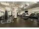 Well-equipped gym with treadmills, weight machines, and mirrors for a complete fitness experience at 881 Memorial Se Dr # 116, Atlanta, GA 30316