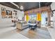 Inviting living room with exposed brick, modern lighting, and comfortable seating area at 881 Memorial Se Dr # 116, Atlanta, GA 30316