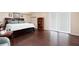 Bedroom with walkout to patio and closet storage at 1104 Fox Ln, Woodstock, GA 30188