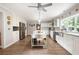 Bright, white kitchen with stainless steel appliances and modern island at 1104 Fox Ln, Woodstock, GA 30188
