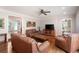 Cozy living room with hardwood floors and comfortable seating at 1104 Fox Ln, Woodstock, GA 30188