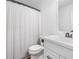 Bathroom featuring a shower/tub combo, white vanity and a mirror at 1139 Shiloh Nw Ln, Kennesaw, GA 30144