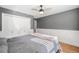Bedroom featuring paneled walls, wood-look flooring and large closets at 1139 Shiloh Nw Ln, Kennesaw, GA 30144
