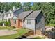 Charming two story home with a combination of brick and vinyl siding, featuring a well maintained front lawn at 1139 Shiloh Nw Ln, Kennesaw, GA 30144