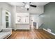 Bright living room features hardwood floors, high ceilings and view into the kitchen at 1139 Shiloh Nw Ln, Kennesaw, GA 30144