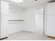 Basement storage area with storage cabinets, shelving, and carpeting at 1139 Shiloh Nw Ln, Kennesaw, GA 30144