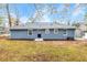 The backyard features a concrete patio, level yard, and a blue exterior at 2899 Gresham Se Rd, Atlanta, GA 30316