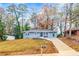Attractive ranch-style home with a well-manicured lawn and a newly paved driveway at 2899 Gresham Se Rd, Atlanta, GA 30316