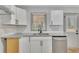 Open kitchen area featuring stainless steel appliances, granite counters, and lots of natural light at 2899 Gresham Se Rd, Atlanta, GA 30316