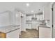 An updated kitchen with granite counters, white cabinets, and stainless steel appliances at 2899 Gresham Se Rd, Atlanta, GA 30316