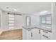 Bright kitchen with granite countertops and a sliding barn door for extra privacy at 2899 Gresham Se Rd, Atlanta, GA 30316