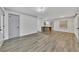 Modern living room with open floor plan, hardwood floors, and neutral color palette at 2899 Gresham Se Rd, Atlanta, GA 30316