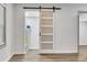 Utility room with sliding barn door access at 2899 Gresham Se Rd, Atlanta, GA 30316