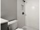 Bathroom featuring a tiled shower with a built-in shelf at 3545 Turtle Cove Se Ct, Marietta, GA 30067