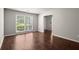 Bright bedroom with large windows offering natural light and hardwood floors at 3545 Turtle Cove Se Ct, Marietta, GA 30067