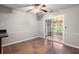 Bright dining area featuring tile floors and sliding glass doors leading to the sunroom at 3545 Turtle Cove Se Ct, Marietta, GA 30067