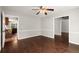 Dining room with hardwood floors, ceiling fan, and easy access to the kitchen at 3545 Turtle Cove Se Ct, Marietta, GA 30067