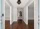 Inviting foyer with hardwood floors, with entrances to dining and living spaces at 3545 Turtle Cove Se Ct, Marietta, GA 30067
