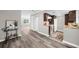 Open-concept view of the kitchen and dining area with modern flooring throughout at 406 Northdale Ct, Lawrenceville, GA 30046