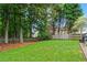 A nicely landscaped backyard with plenty of room to roam around at 585 Ashland Pkwy, Woodstock, GA 30189