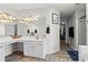 Spacious bathroom with dual sinks, vanity area, and ample lighting, creating a functional and stylish space at 585 Ashland Pkwy, Woodstock, GA 30189